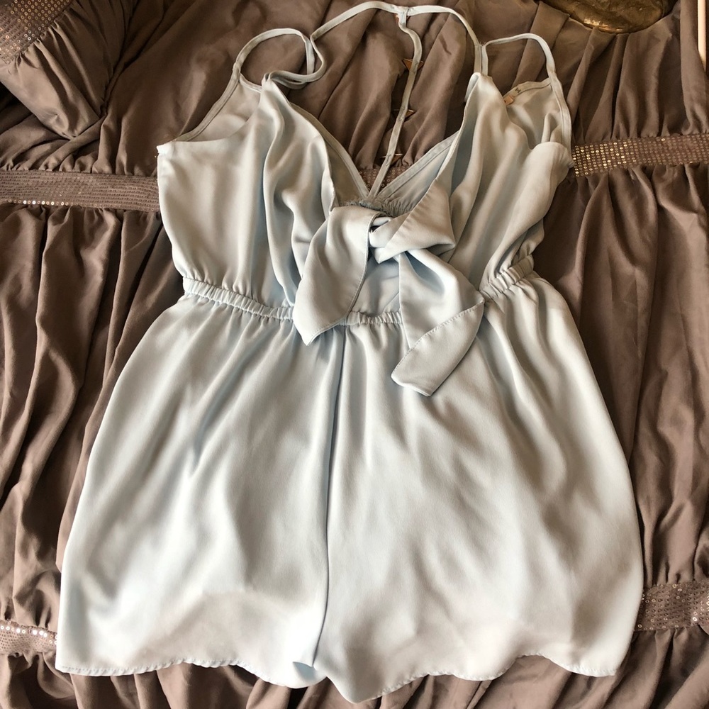 Beautiful baby blue romper with gold jewls